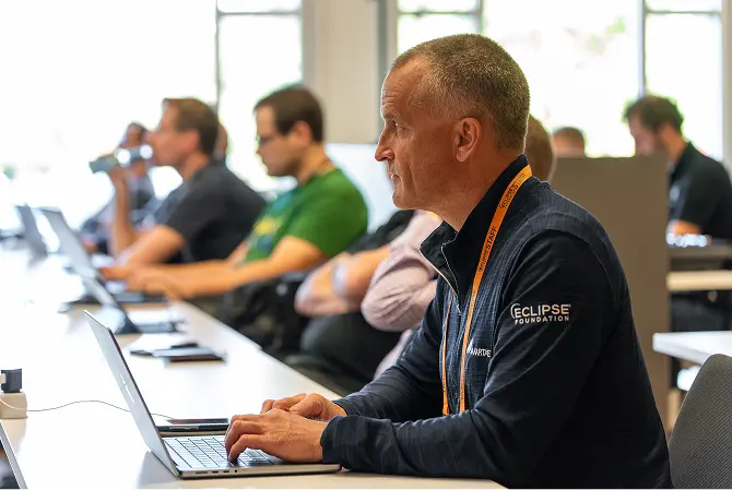 a group of people attending a conference session